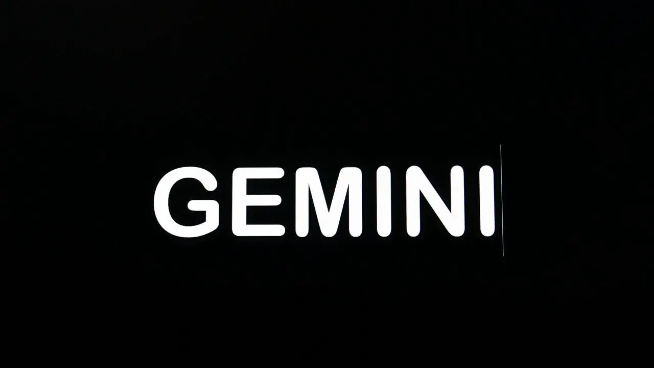 Typing on screen with black background written Gemini