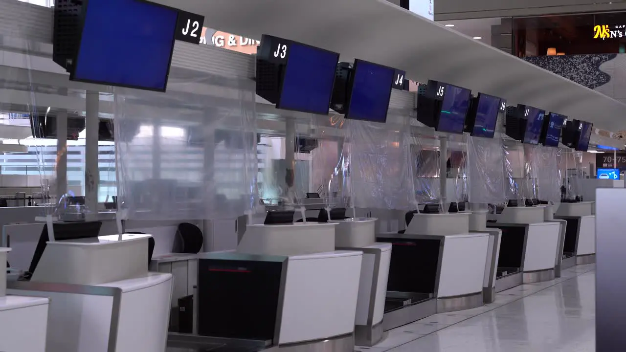 Empty Check in counters with blue screens at Airport due to Corona Pandemic