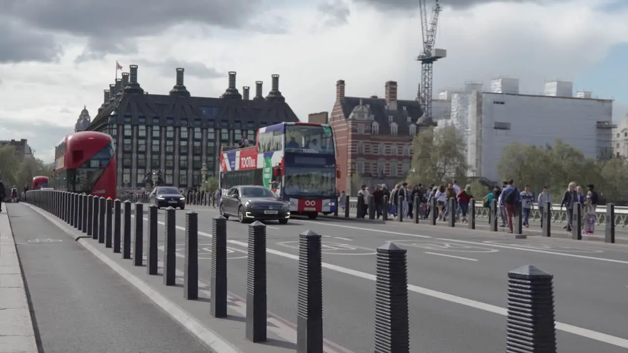 Street Level Shot from Westminster Bridge of Double Decker Bus Driving By