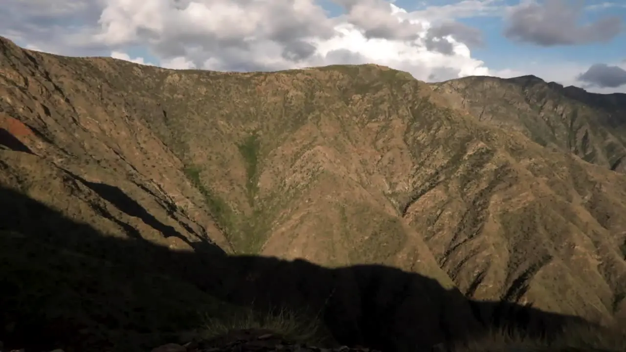 sunset shadow falling over the mountain