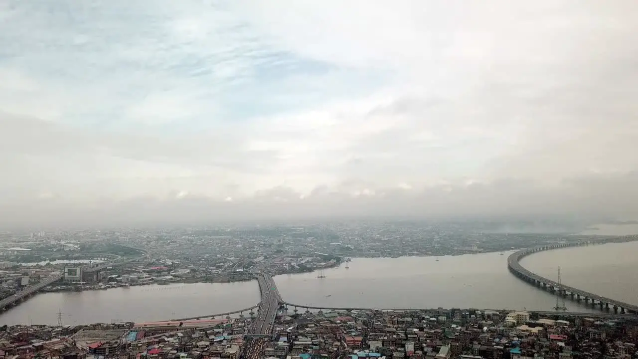 Slow drone flight towards bridges over Lagos' lagoon