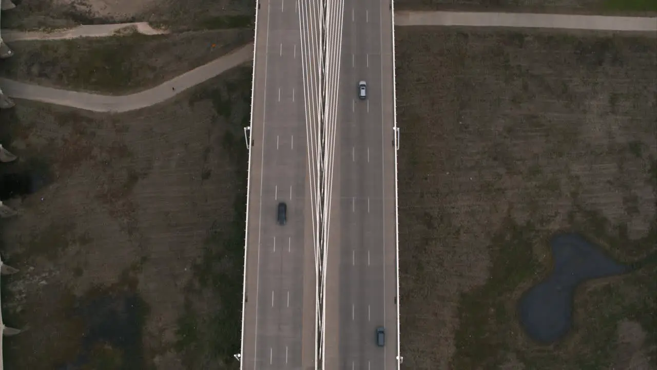 Birds eye view of cars going over the The Margaret Hunt Hill Bridge in Dallas