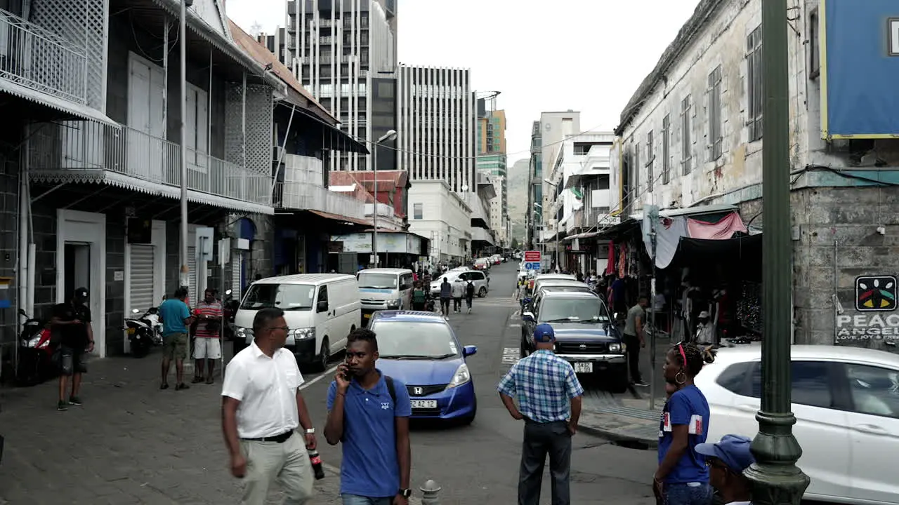 4K Steady shot of mauritian people crossing street in Port Louis Mauritius