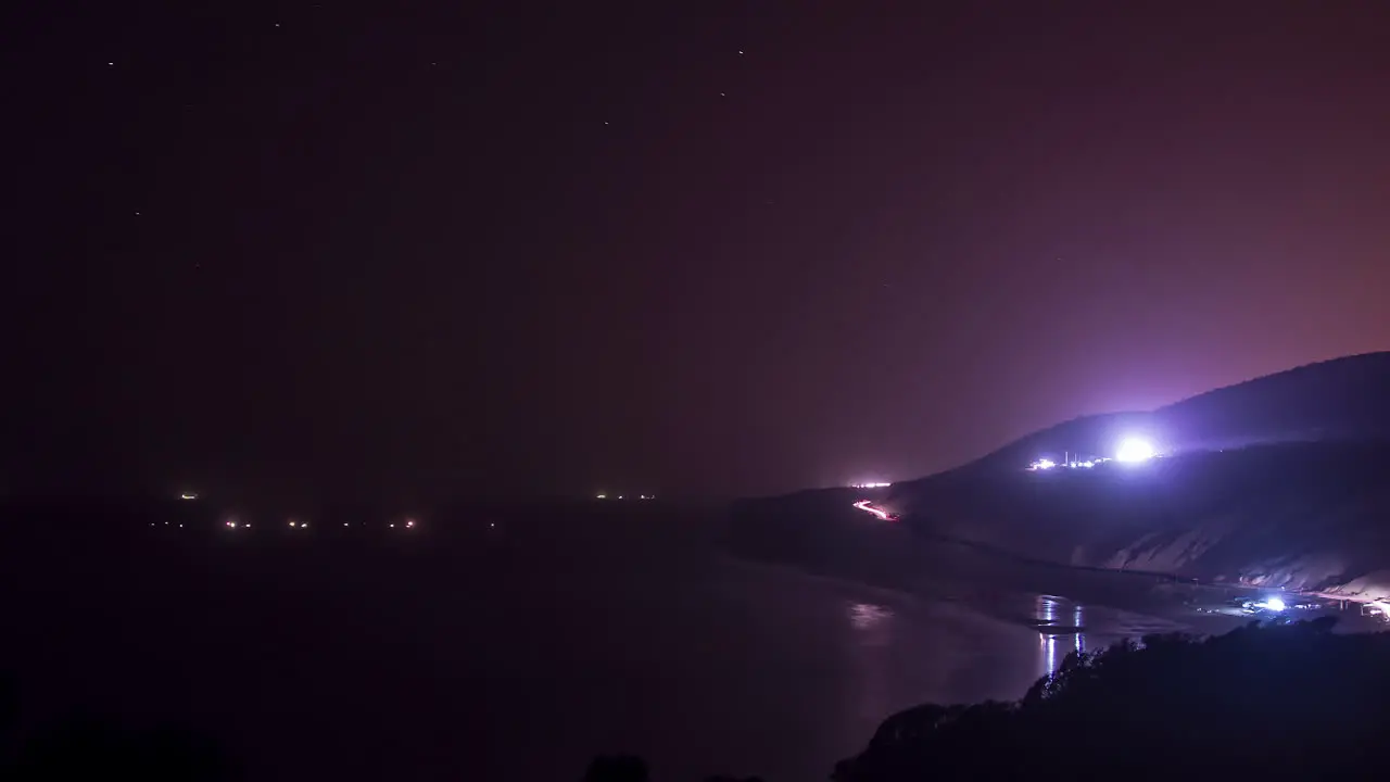 Time lapse of cars driving along the shore of the Atlantic Ocean at Agadir Morocco