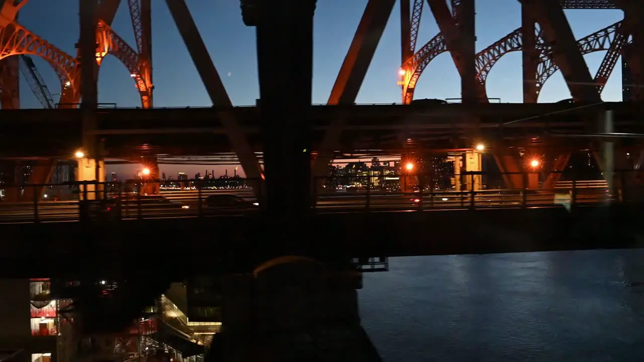 New York City tram view of Queensboro Bridge at night