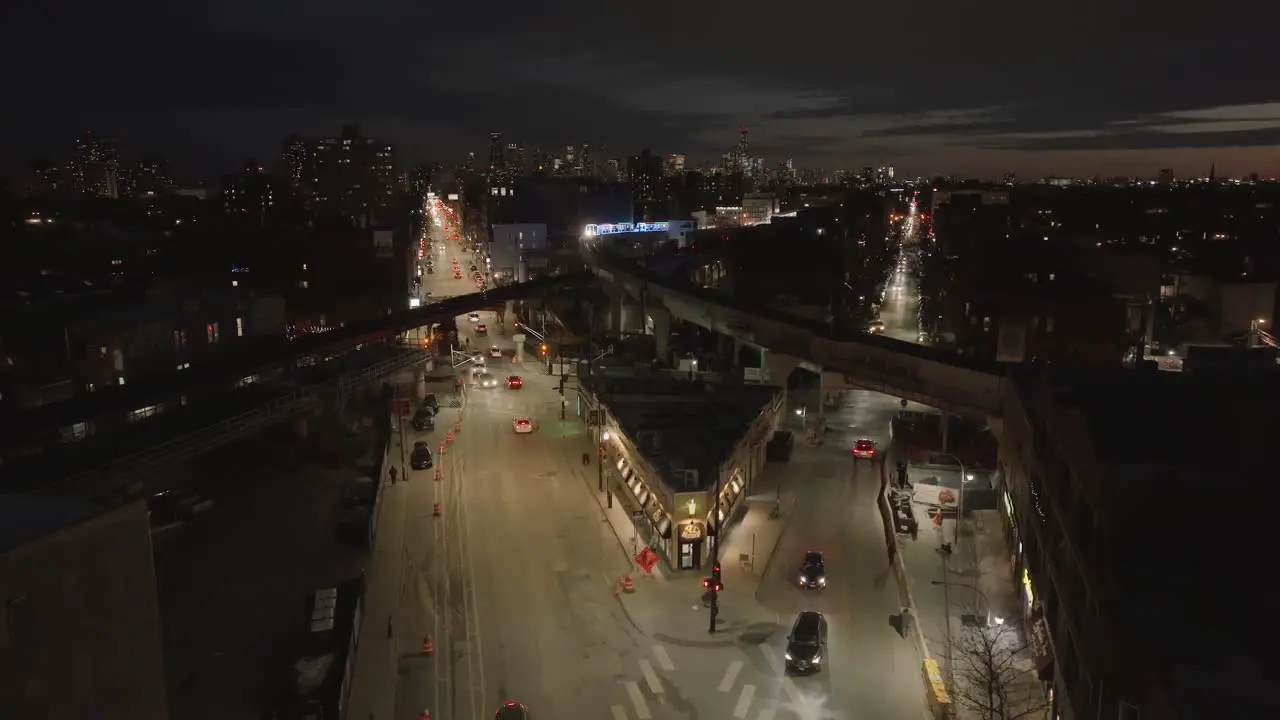 Aerial view of the illuminated CTA holiday train on a elevated rail night in Chicago USA