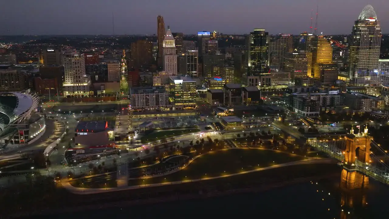 Aerial view of the Cincinnati skyline fall evening in Ohio USA circling drone shot