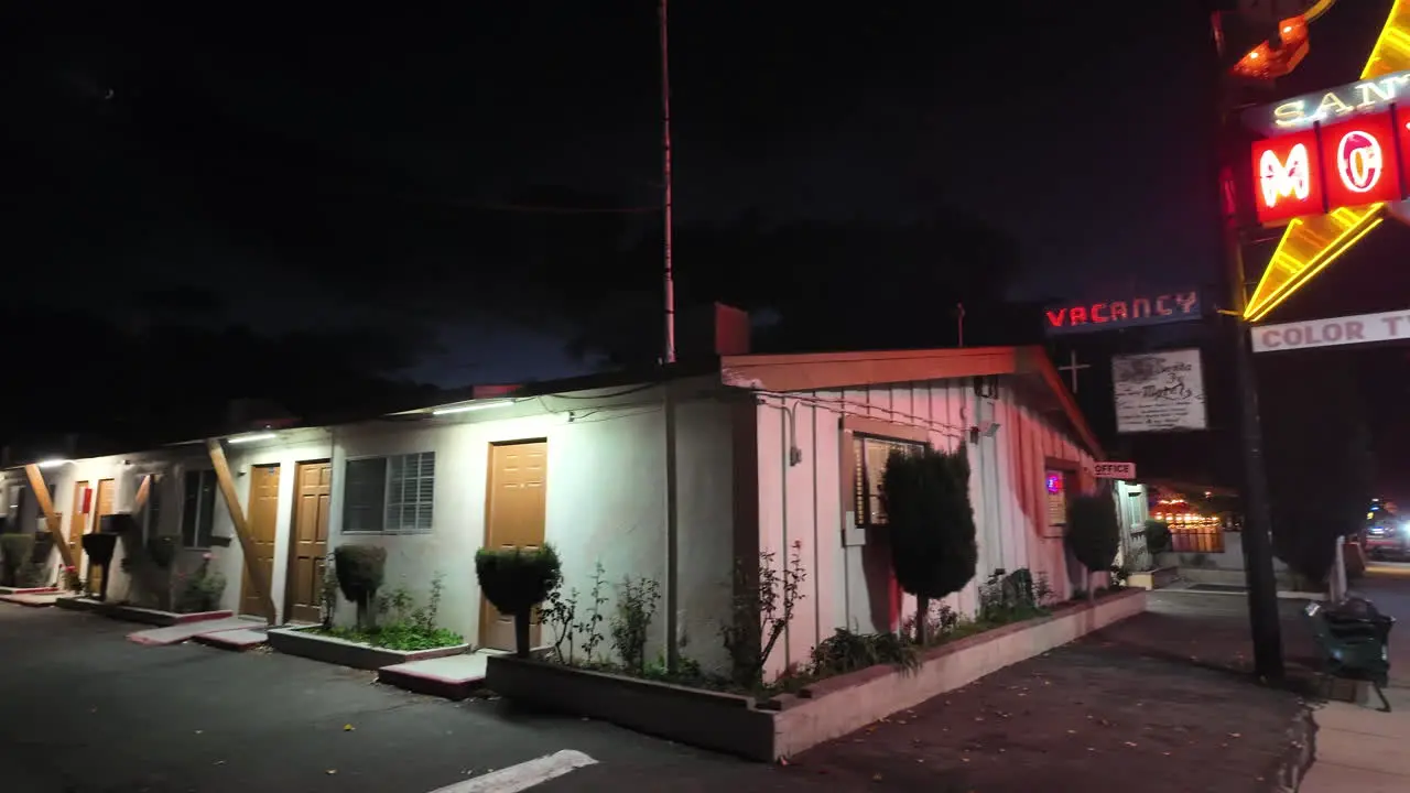 Santa Fe Motel neon sign panning reveal at nighttime