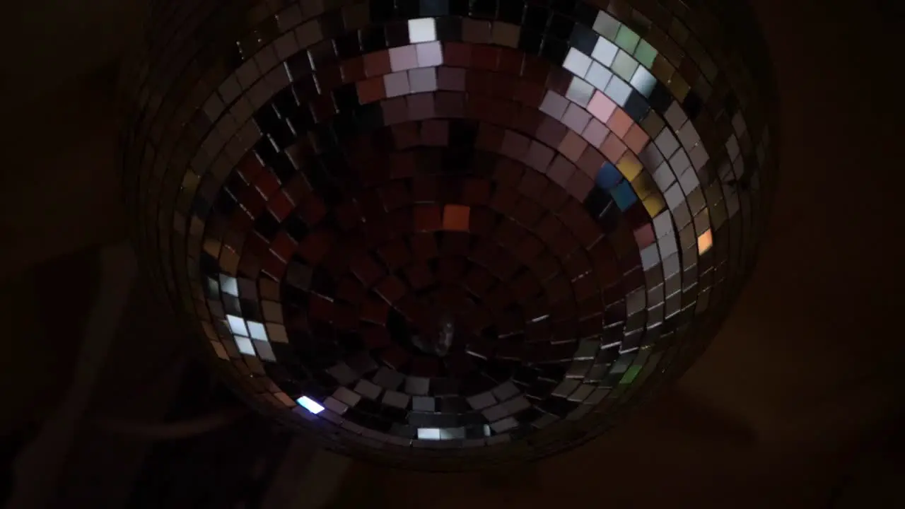 Slow motion shot of Mirror ball spinning Close up