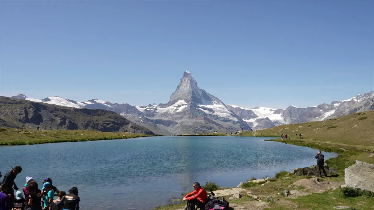 Zermatt Switzerland circa  Timelapse Matterhorn with alpine lake Stellisee in Zermatt Switzerland Europe