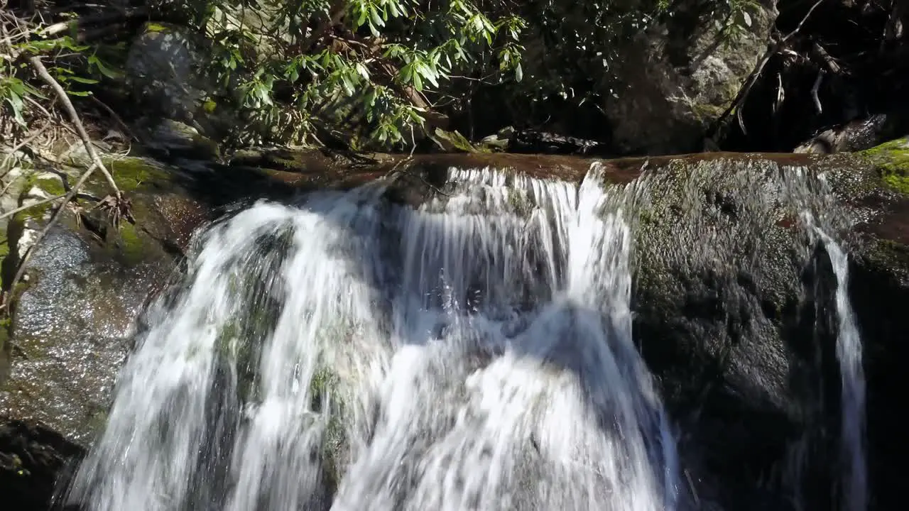 Aerial pullout from a raging waterfall in the Blue Ridge Mountain Range