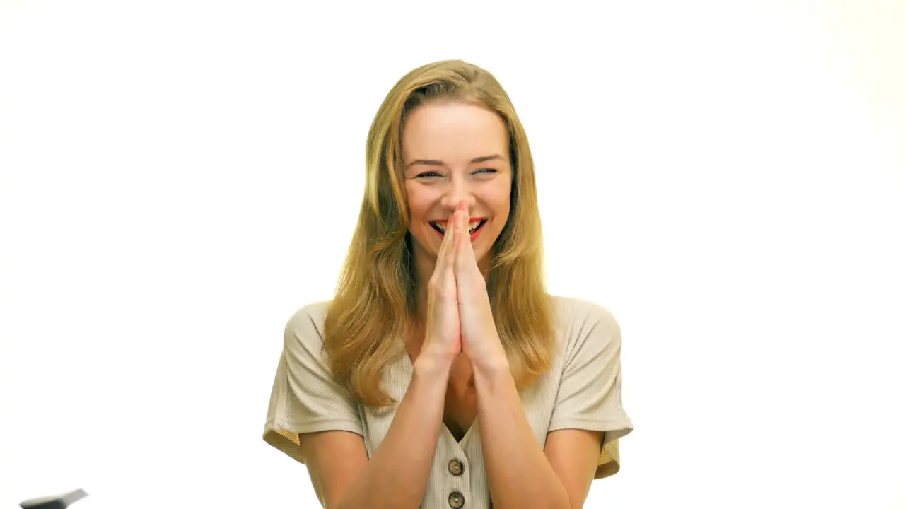 Portrait of a laughing woman looking at the camera