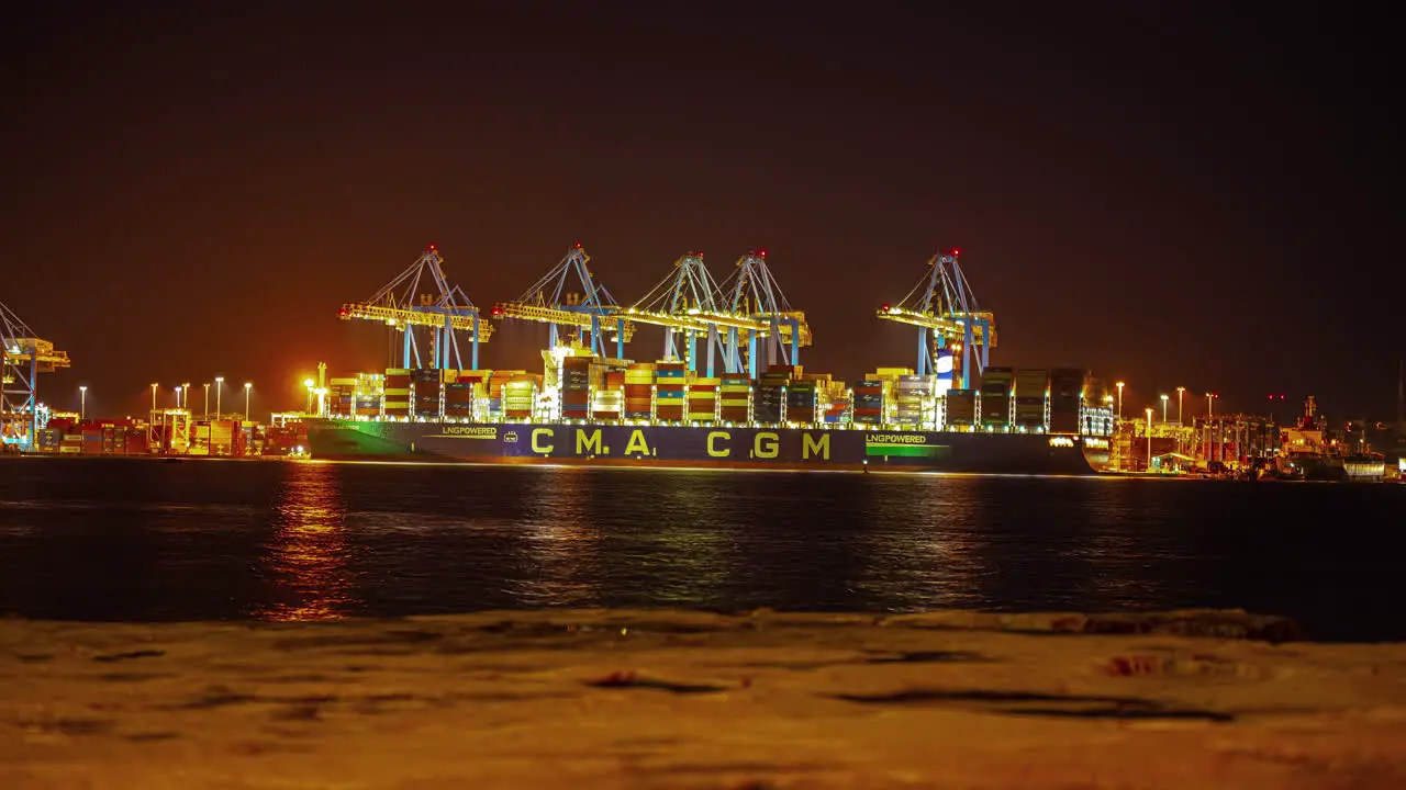 Port terminal operations in the Bay of Marsaxlokk in Ghar ir Rih Malta at nighttime time lapse