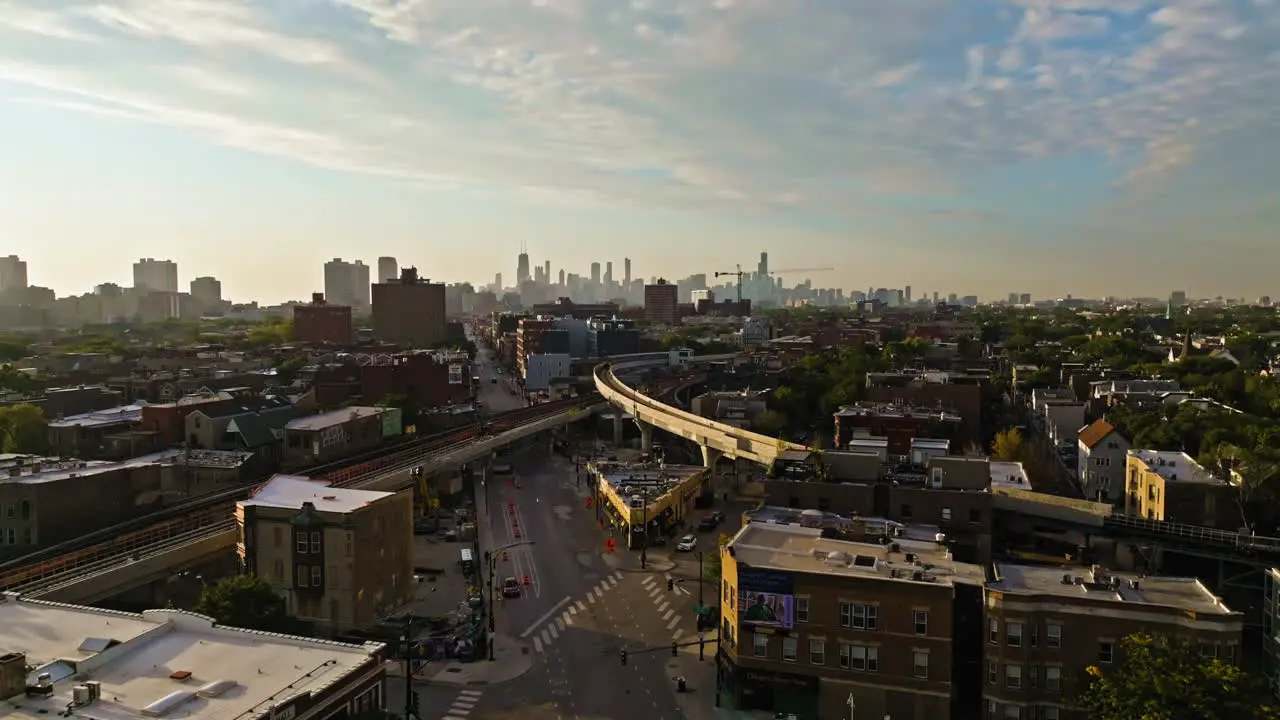 Aerial ascending shot of the cityscape of Wrigleyville golden hour in Chicago