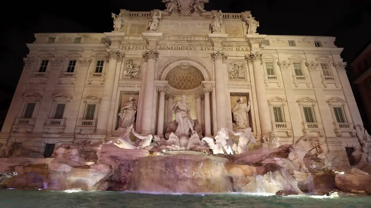 Rome Trevi Fountain wide shot from the front at Night