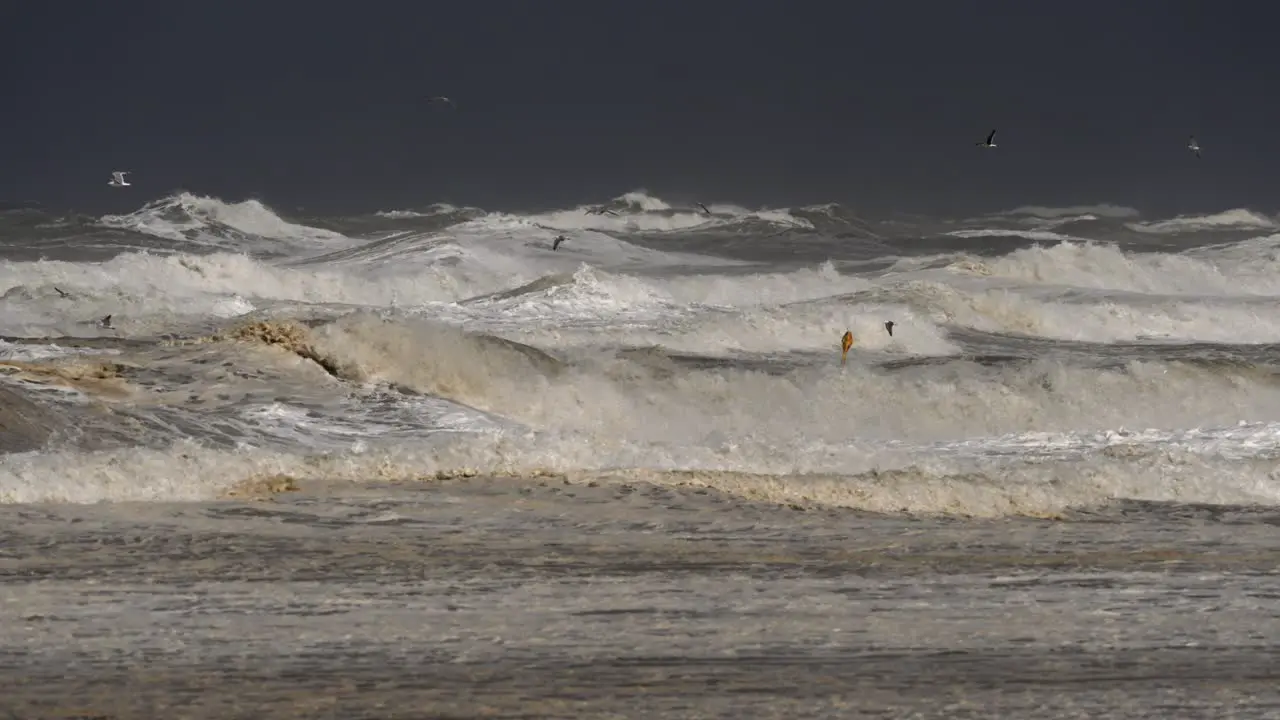 Storm at sea winds big waves crash at Scheveningen Den Haag The Netherlands