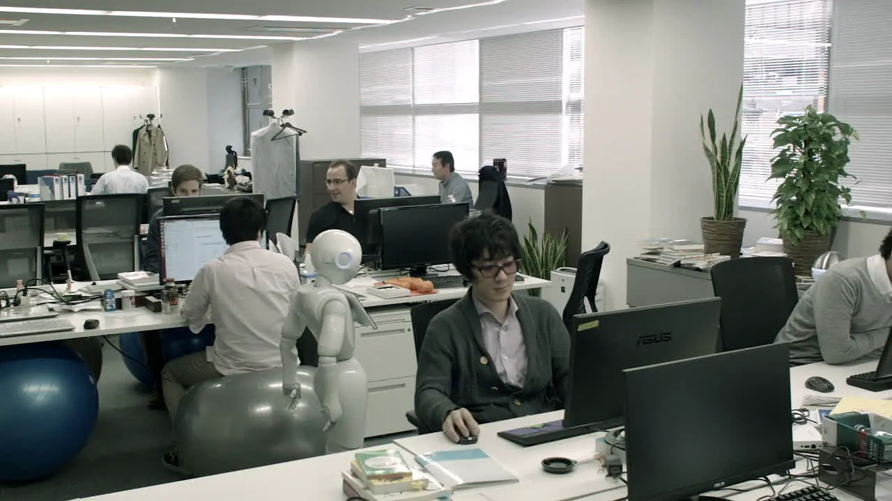 Robot Pepper working inside a office space