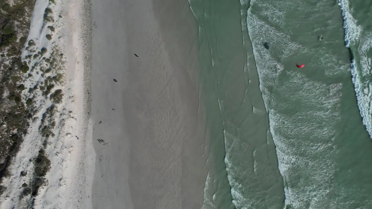 top down aerial kite surfer at big bay beach in cape town South Africa