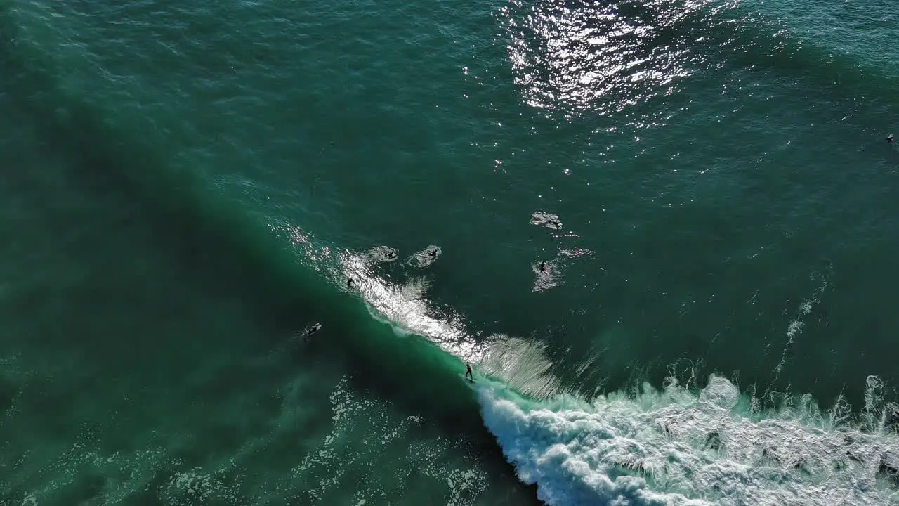 Surfing big waves on a coast of Zumaia Spain aerial view