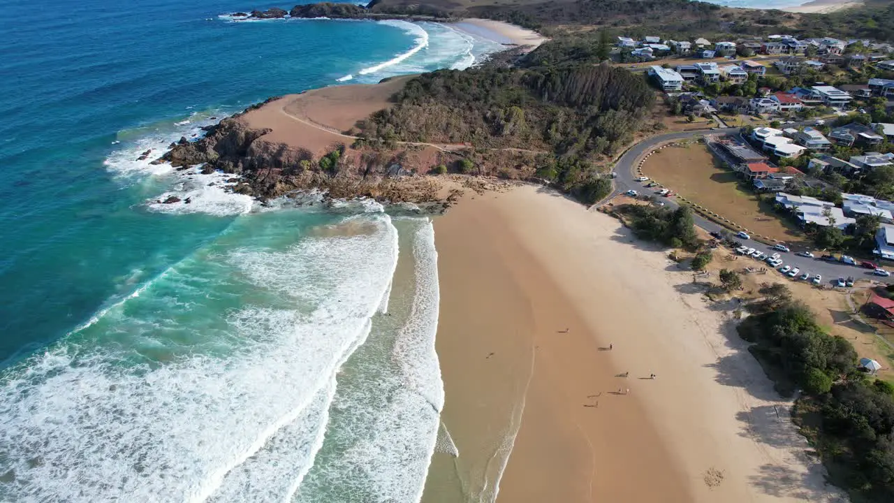 Waves And People At The Seashore Of Emerald Beach Town Near Coffs Harbour In New South Wales Australia