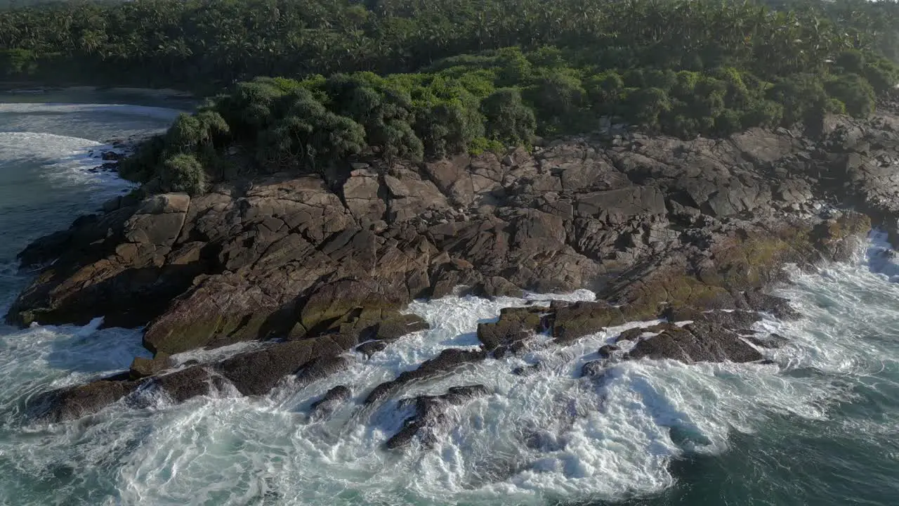 Establishing Aerial Drone Shot of Rocky Headland in Tropical Country Southern Sri Lanka