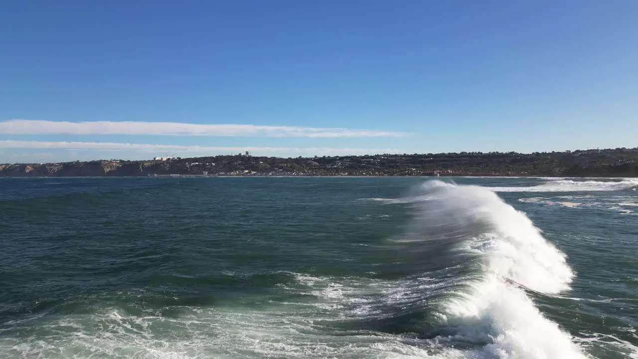 4K Footage of large ocean waves crashing on cliffs at high tide in La Jolla Cove in San Diego California