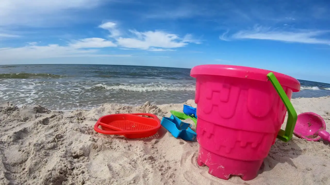 Plastic Toys on Sandy Beach