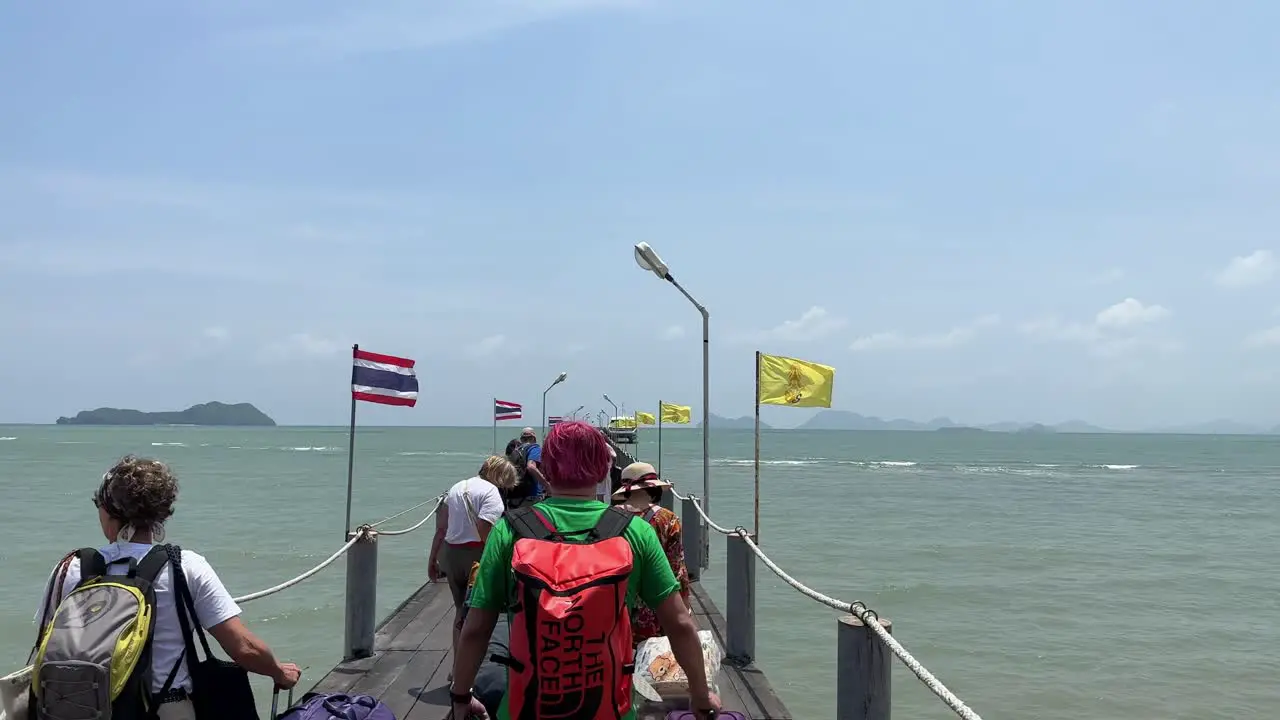 People Walking on Dock in Koh Samui Island Thailand