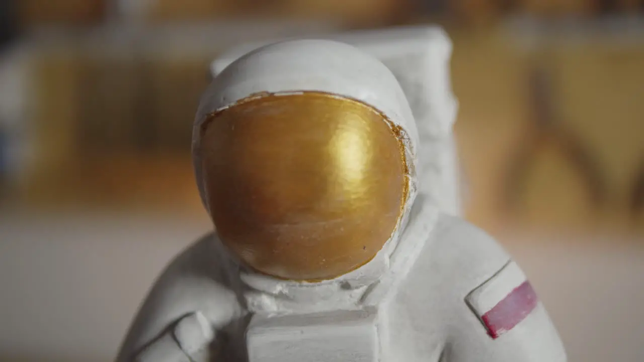 Slow Pan on Space Astronaut Figure Bottom to Top