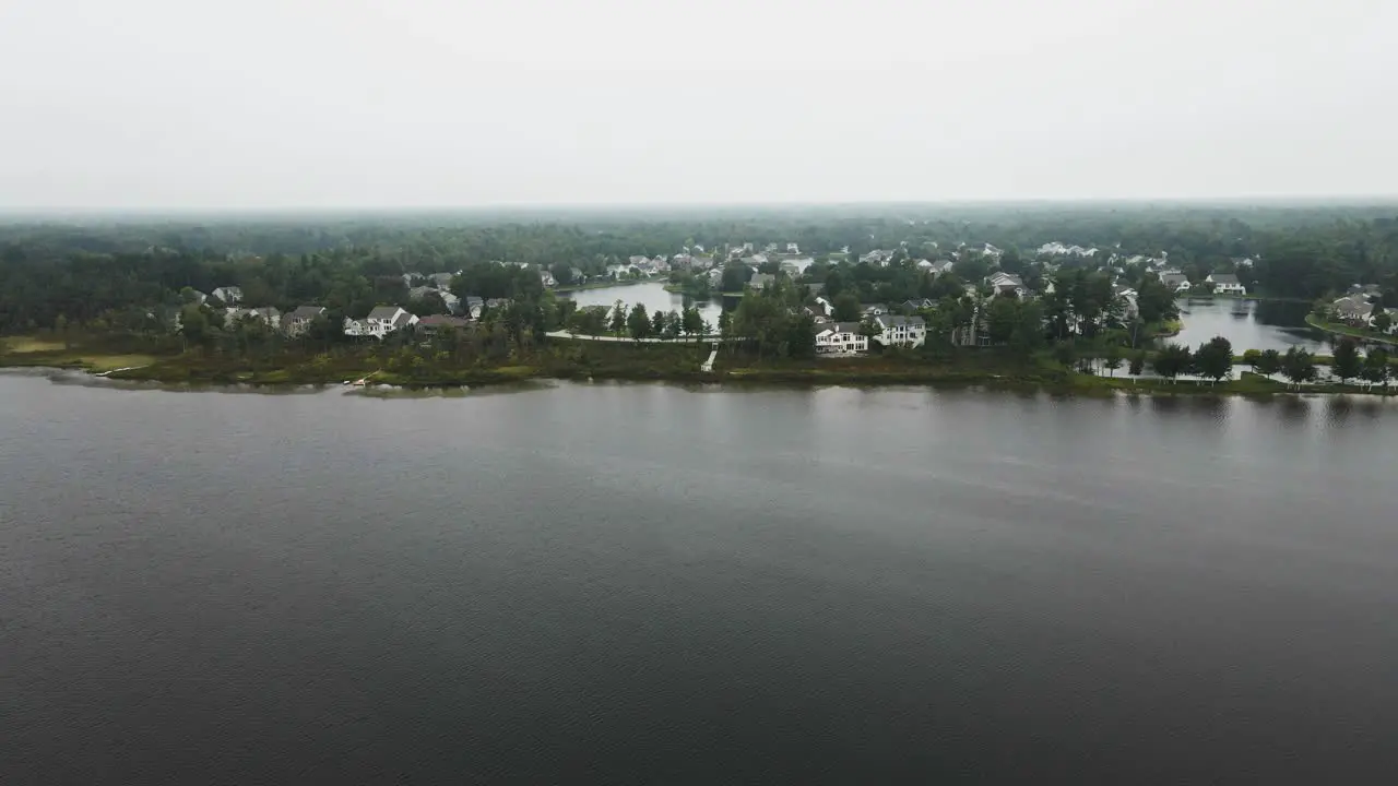 Mist covered suburban neighborhood in early fall