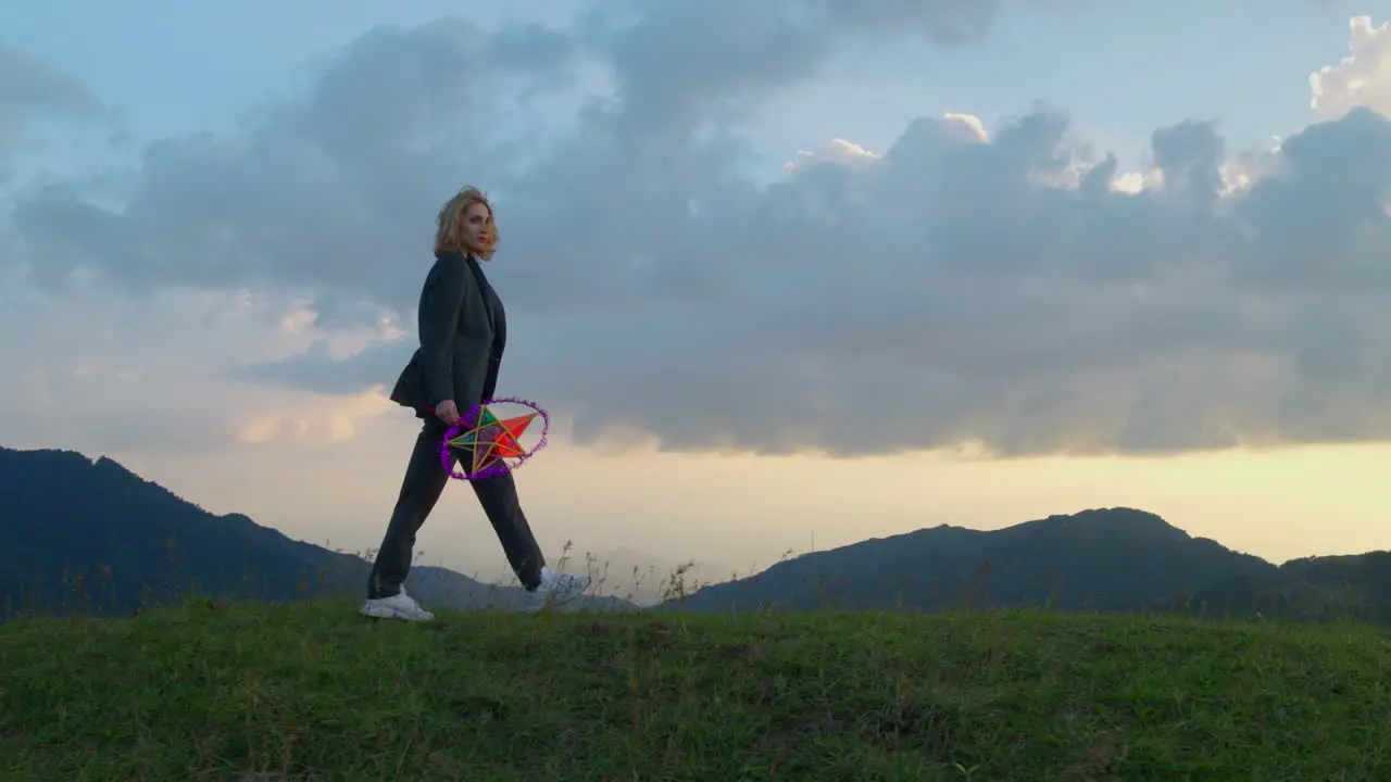 Slow motion shot of a woman holding a start lantern celebrating the mid-autumn festival