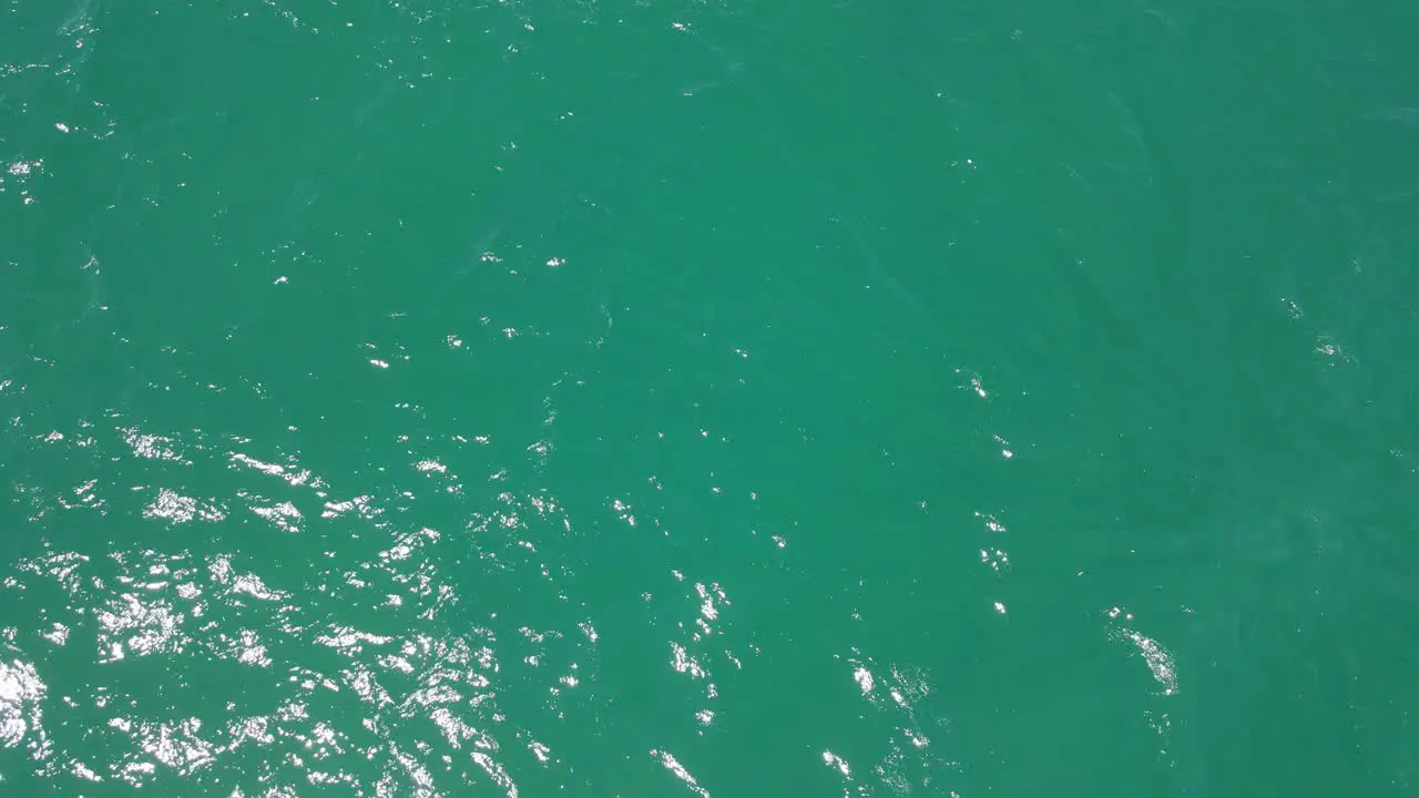 Aerial View Of Rippling Blue Seascape With Sunlight Reflection In Summer