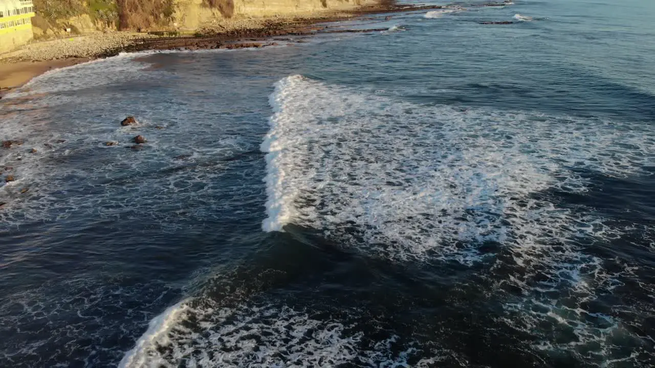 Riding over sea in a incredible sunset of Cascais