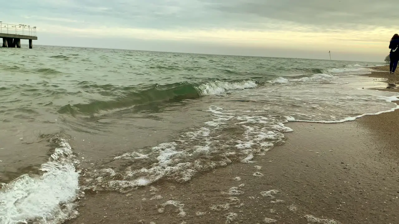 High waves close to the shore sea climate in the autumn season rough water builds huge waves