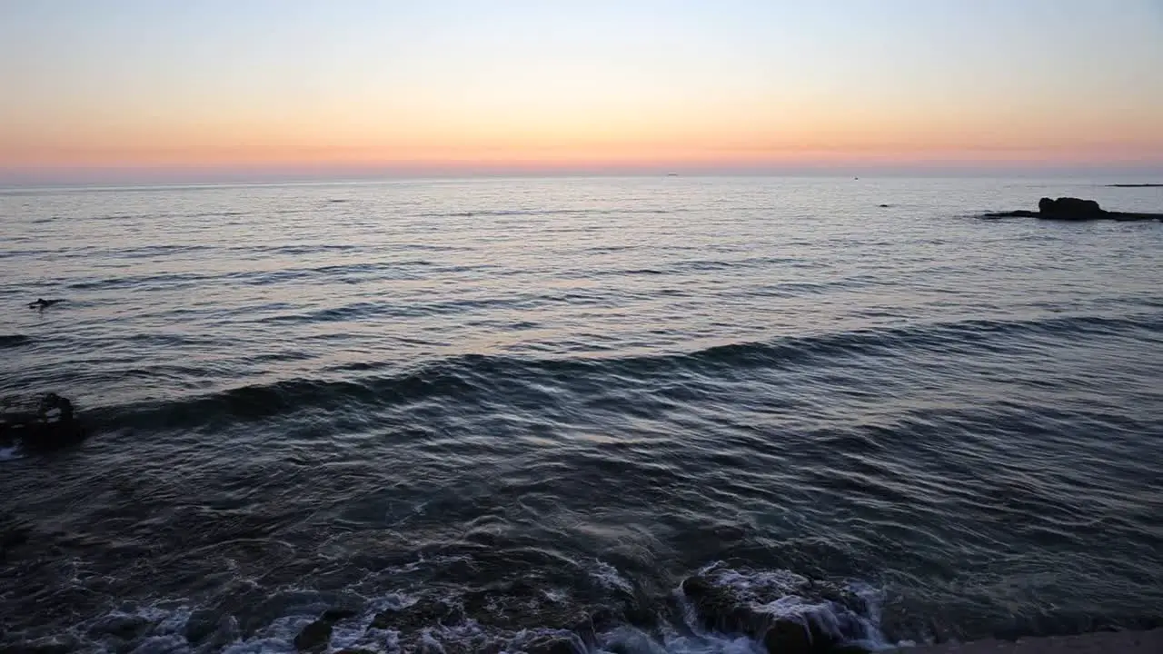 Waves Crashing on Lebanon Coastline with Beautiful Mediterranean Sunset