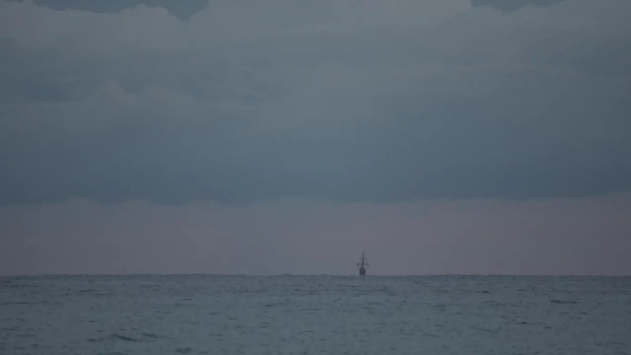 16th Century Galleon Andalucia replica ship sailing in the distance in the Mediterranean sea in a cloudy day