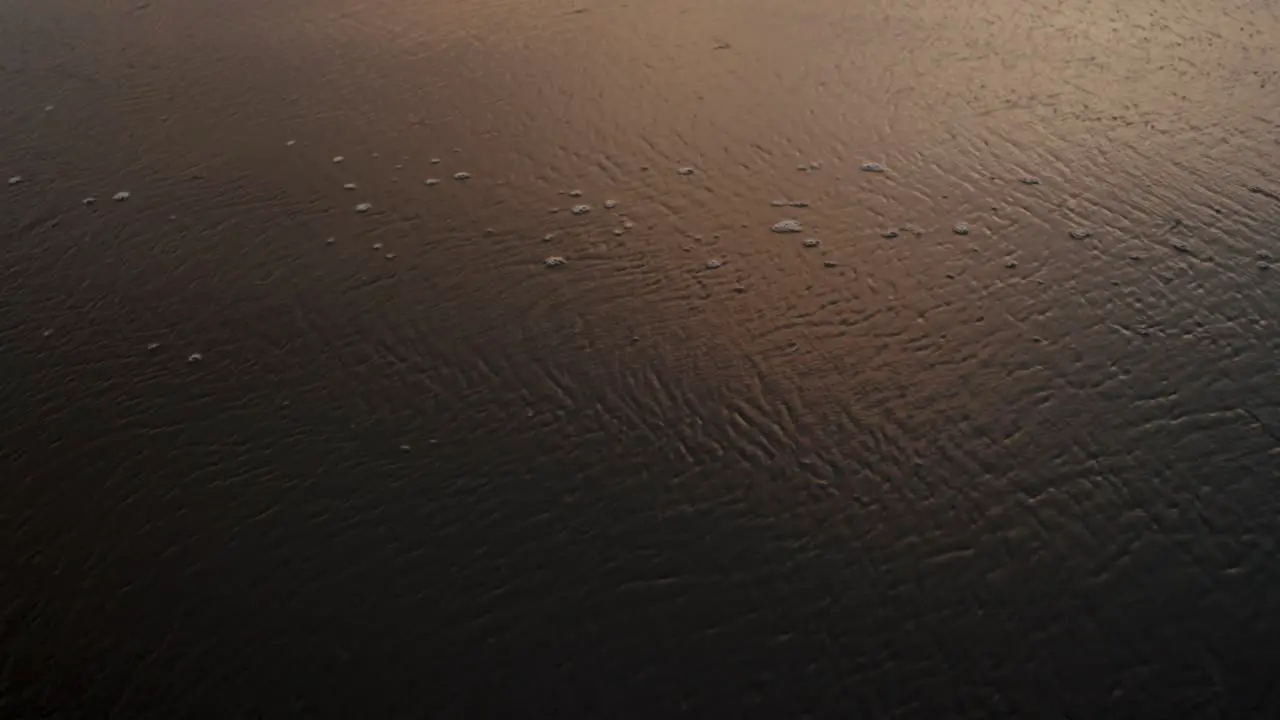 Sea Waves Washing The Shore During Sunset In Tropical Beach