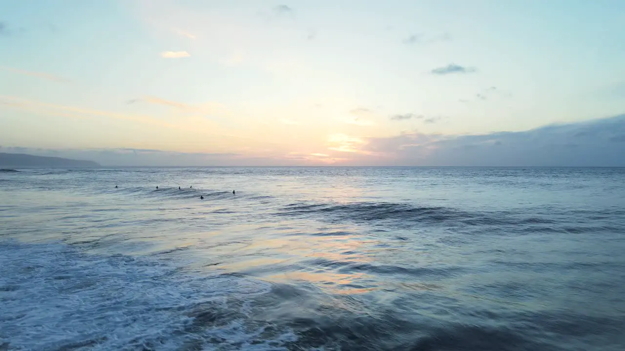 Surfers Waiting For The Next Wave At Sunset North Shore Oahu Hawaii