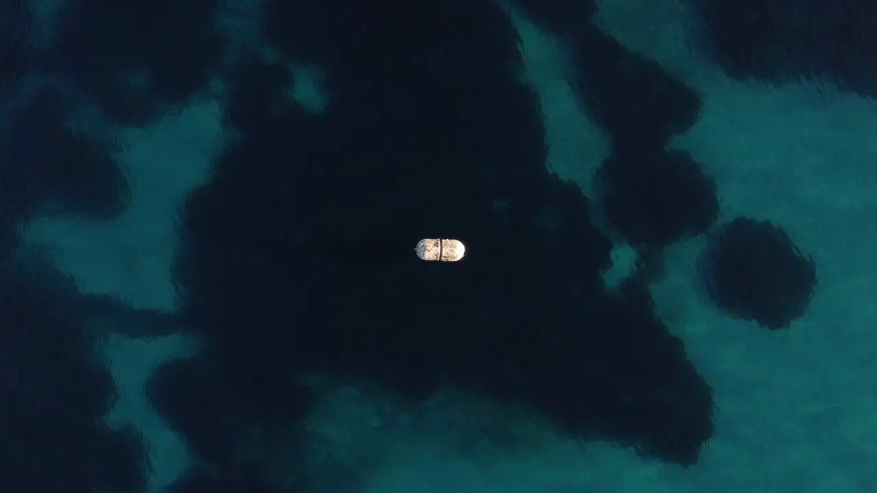 Mooring buoy in dark water ocean