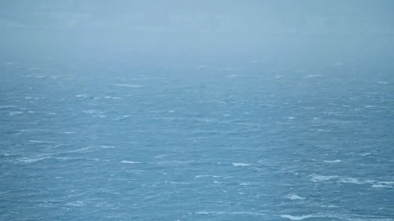 Misty Blue Seascape With Calm Waves Near Vanvikan In Indre Fosen Norway