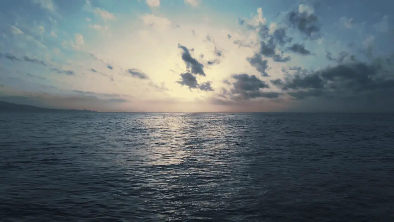 Cinemagraph loop of aerial dramatic sunrise on the sea