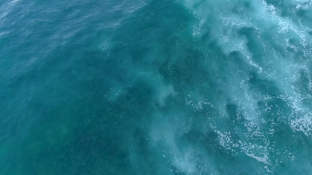 Glorious Motion of the Ocean Turbulent Blue Waters Over the Reef