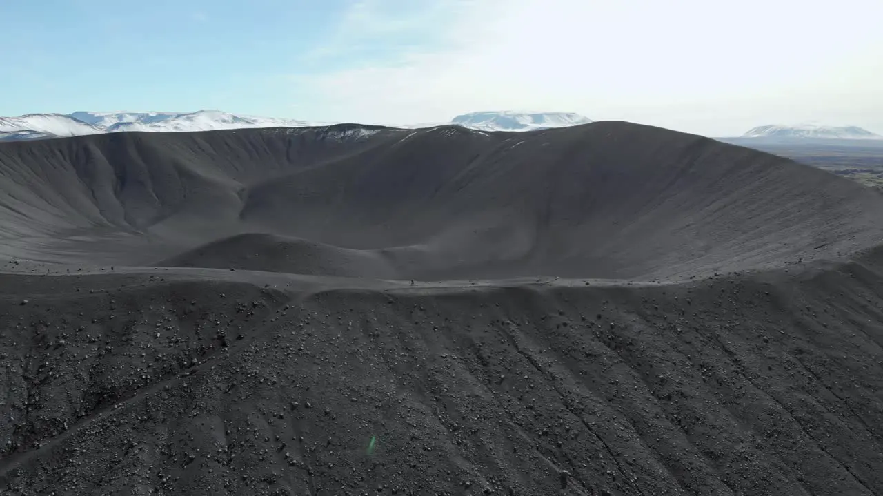 Zoom out aerial of the black Hverfell vulcano on Iceland