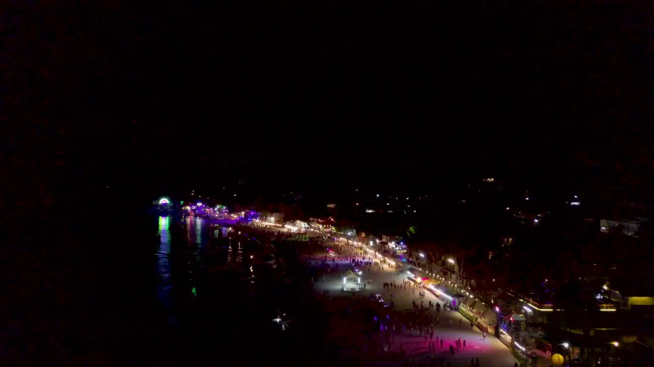 Wide Aerial of Beach with Lights and Fireworks at the Full Moon Party Koh Phangan Thailand