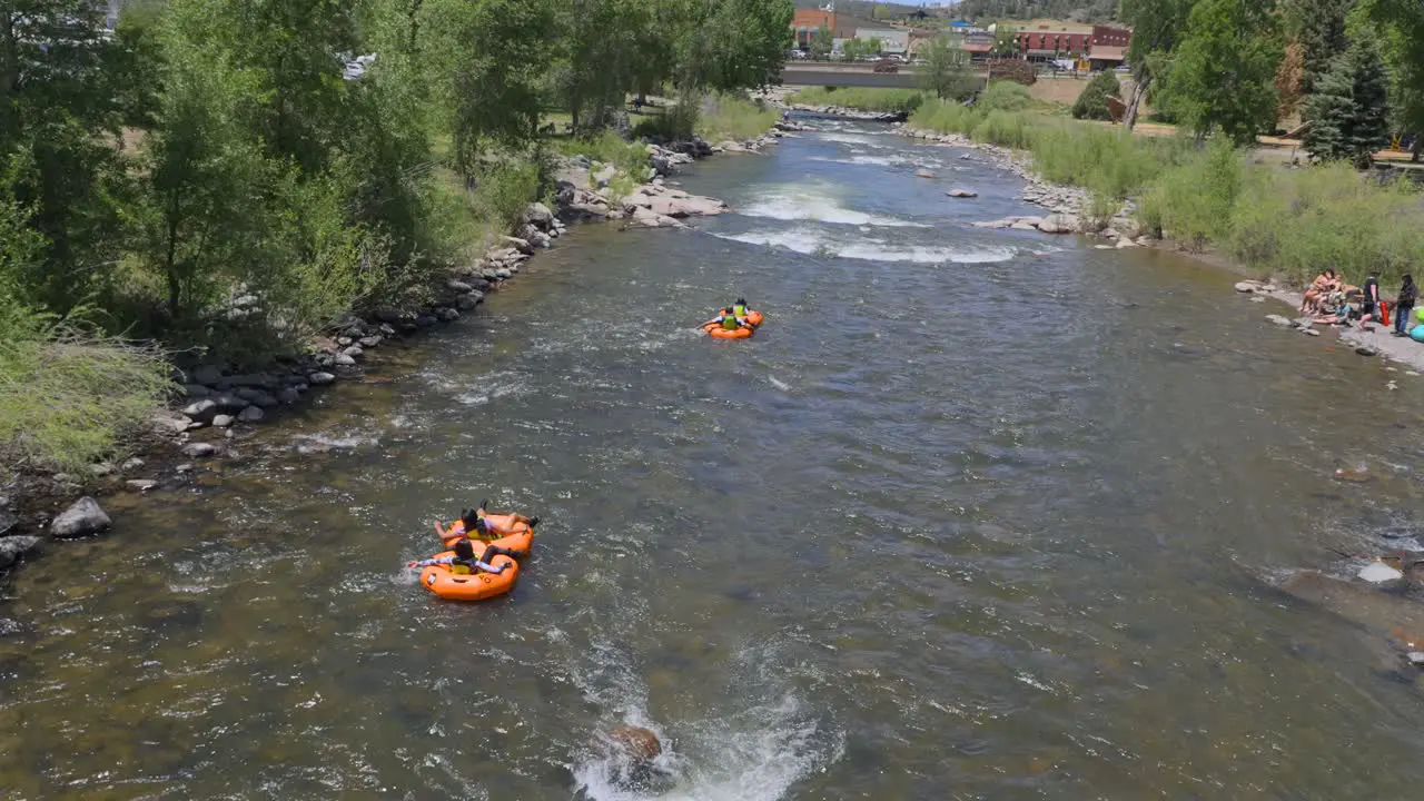 People rafting down the San Juan river in Pagosa Springs CO