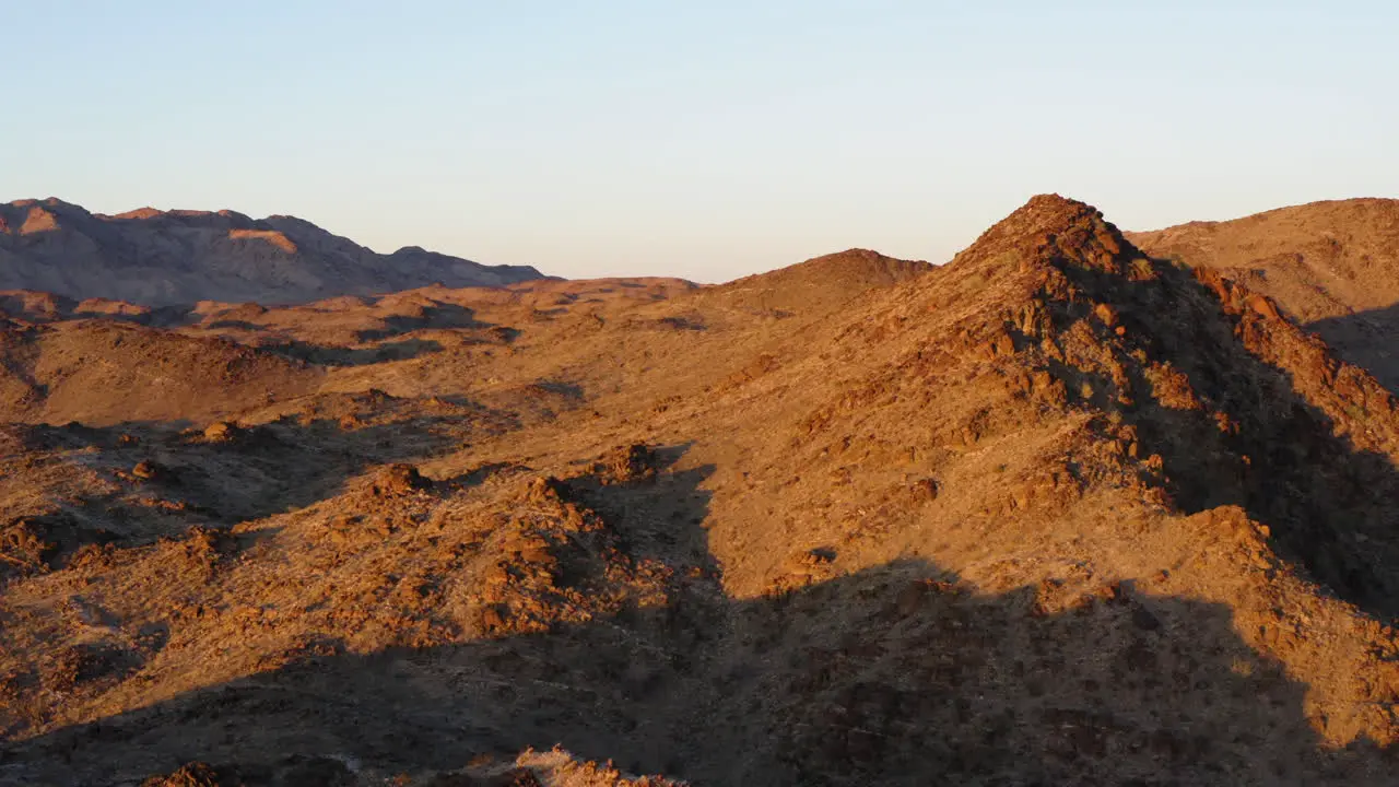 Sunny Rough Hills As Red Cloud Mine Arizona USA Aerial Descending