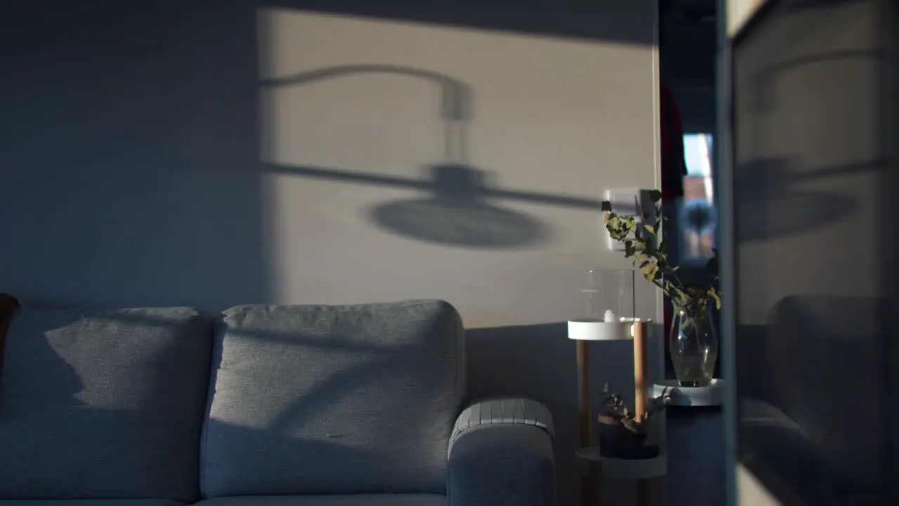 Sunlight making shadow of home equipment on wall time lapse view