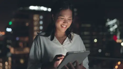 Asian woman tablet and business in night city