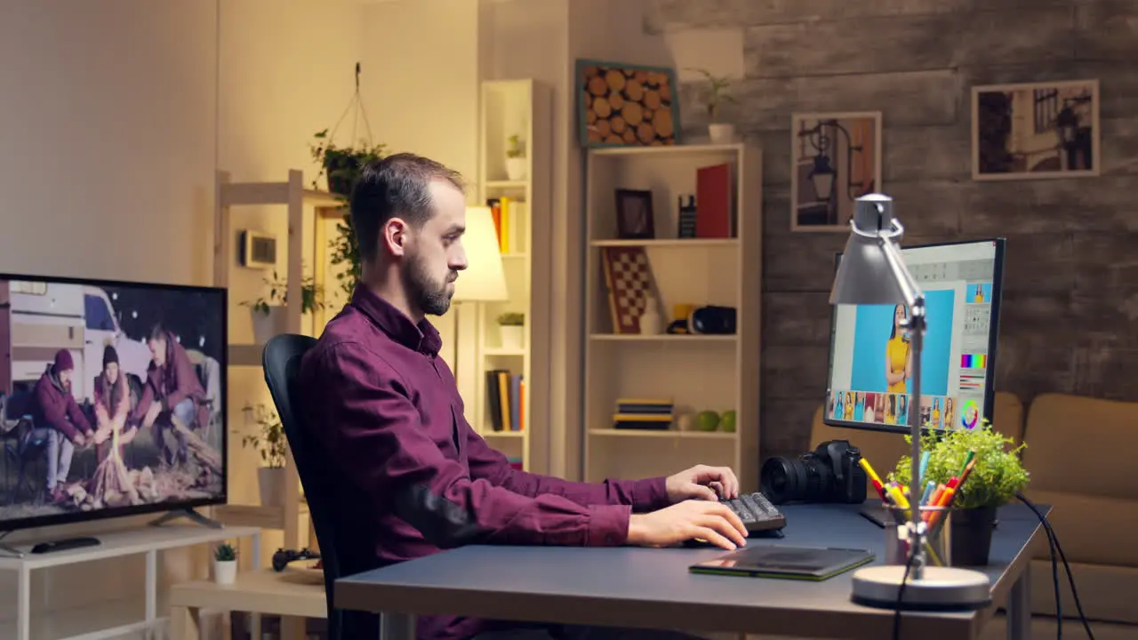 Photographer working on photos from home office