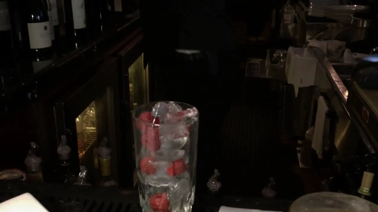 a bartender making a drink